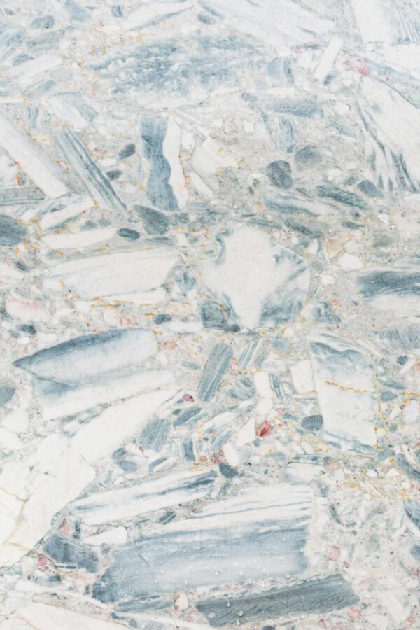 High-resolution abstract texture of white and blue marble stones.